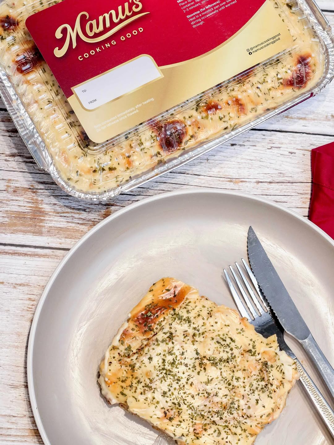 Mamu's baked cream cheese spaghetti on plate with branded tray